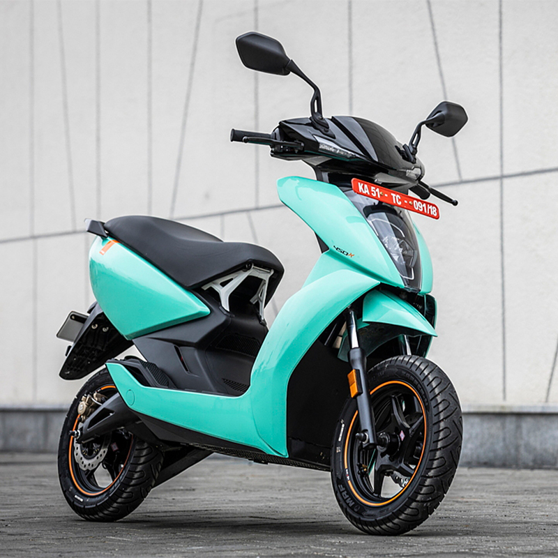 Ather The scooter has a sleek and futuristic design with clean lines and minimalist aesthetics. It features a powerful electric motor, a large touchscreen display, and smart connected features. The scooter also has premium features such as LED lighting, regenerative braking, and a spacious storage compartment. The Ather electric scooter represents eco-friendly transportation with cutting-edge technology and modern styling.