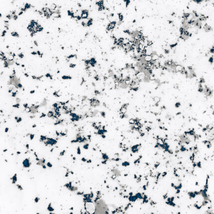 a beautiful natural stone with a dark blue background and intricate white and gray veining.
