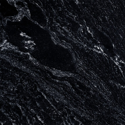 a magnificent natural stone with a dark black background and intricate veins of gray, white, and gold, creating a dramatic and sophisticated look.