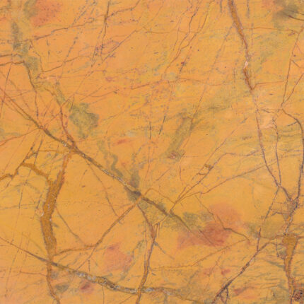 a vibrant and eye-catching natural stone with a yellow background and swirling patterns of black and gray, adding energy and brightness to any room.