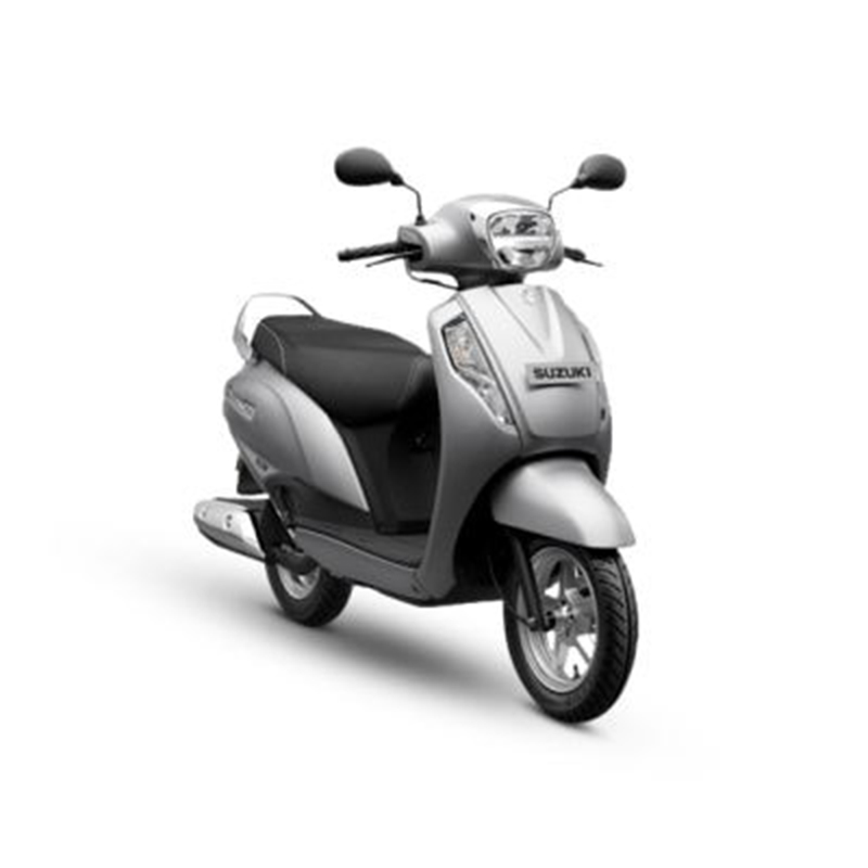 access125-right-side-view_600x400 The scooter features sleek body design, large wheels, and a spacious seat. It has a digital instrument cluster, front and rear disc brakes, and LED headlights. The rider is smiling, indicating a joyful riding experience.