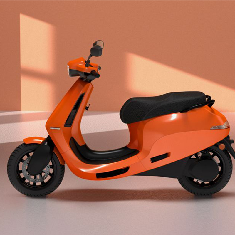 lest-side-view-1066824733_930x620 he scooter features a sleek and modern design with clean lines, LED lighting, and a minimalist aesthetic. It has a compact body, large wheels, and a digital instrument cluster. The scooter is powered by an electric motor and has a removable Lithium-Ion battery, offering a range of up to 150 km per charge. It also has regenerative braking, smartphone connectivity, and a futuristic keyless start system. The alt text highlights the scooter's electric powertrain, cutting-edge features, and sustainable mobility.