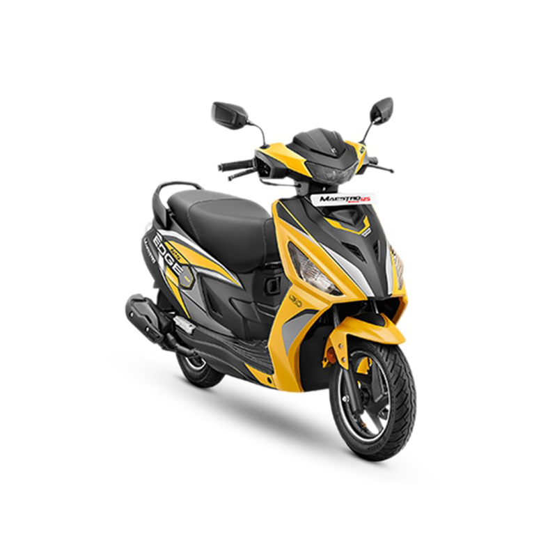 maestro-edge-12561001fe236d23 The scooter features a contemporary design with a sleek body, angular lines, and attractive graphics. It has a large headlamp, alloy wheels, and a digital instrument cluster. The scooter has a comfortable seat with a storage compartment underneath, and it is powered by a fuel-efficient engine with a CVT transmission. It also has telescopic front forks, tubeless tires, and a convenient kick-start feature. The alt text highlights the scooter's modern appearance, practical features, and urban mobility.