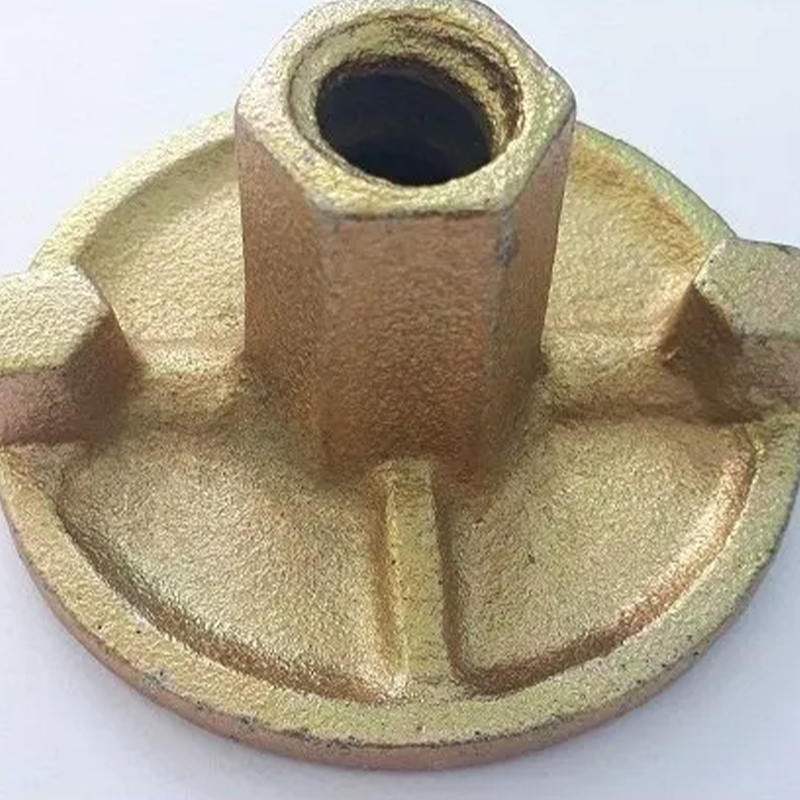 Anchor nut The nut has a round shape and is made of metal with a silver or gray finish. It has threads on the interior to match those of the rod or bolt and is designed to be embedded in concrete or masonry to create a secure connection.