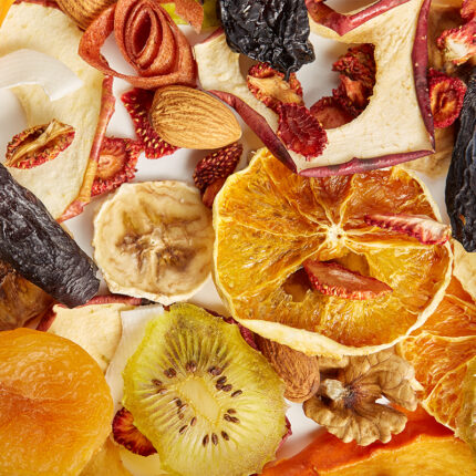 The fruits have a dry and wrinkled appearance due to the freeze-drying process, which removes all moisture from the fruit while preserving its color, flavor, and nutrients. Freeze-dried fruits are a popular snack and ingredient in many recipes, as they have a long shelf life and can be easily rehydrated by adding water.