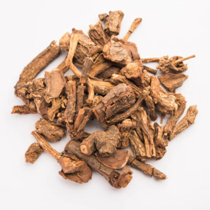 The sarsaparilla root is thin and woody with a dark brown color and a slightly curved shape. It is twisted and knotted, with visible knots and grooves along its surface. The image captures the appearance of dried sarsaparilla root, a plant root commonly used for its medicinal properties. The alt text conveys the thin, woody texture, dark brown color, and twisted, knotted appearance of the sarsaparilla root.
