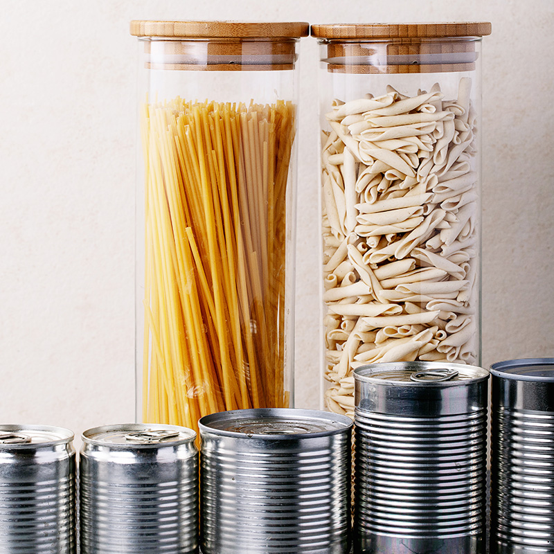 Spaghetti canister This canister typically features a cylindrical shape with a secure lid. It is often made of durable materials such as glass or plastic.