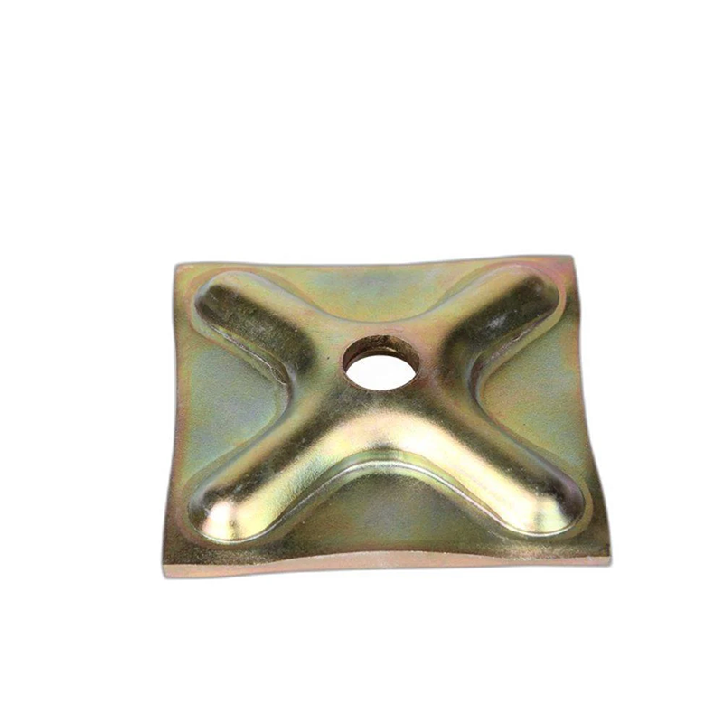 Waller plate The plate has a square or rectangular shape and is made of metal with a silver or gray finish. It has four holes drilled into the corners, allowing it to be securely bolted to the wall or surface. The center of the plate has a hole or channel for the scaffold tube to pass through. The waller plate is designed to distribute the weight of the scaffold and improve stability and safety.