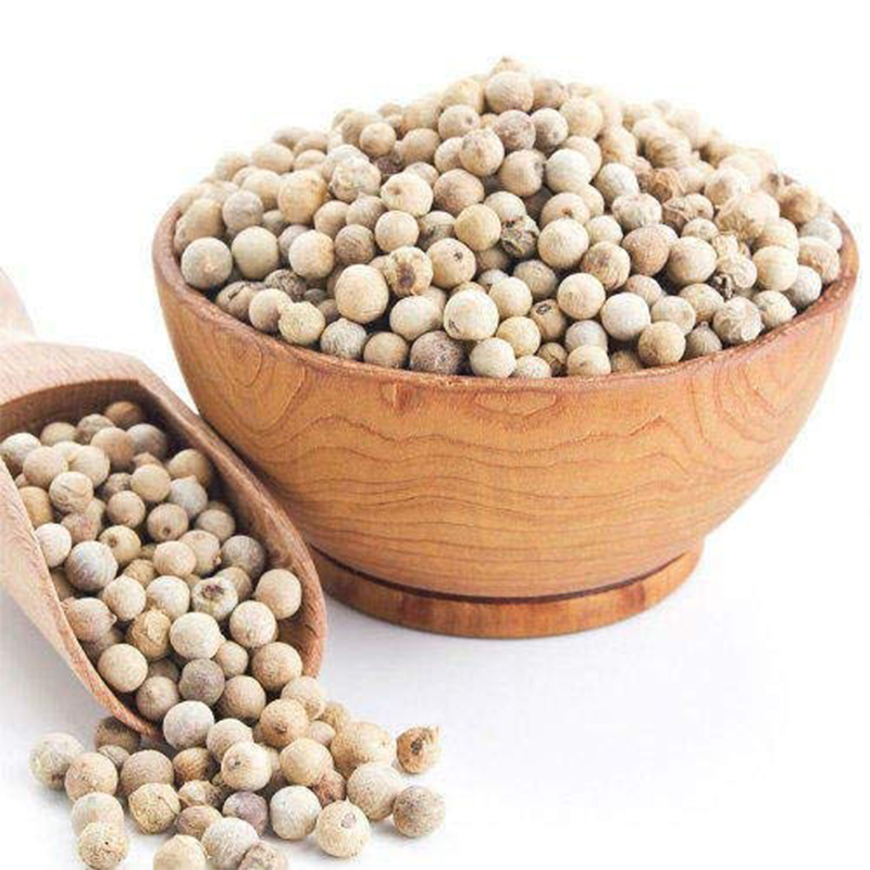 White Pepper white peppercorns, a spice derived from the dried berries of the Piper nigrum plant, which are then husked to remove the outer layer, resulting in a white-colored peppercorn with a slightly milder taste than black pepper. White pepper is commonly used in cooking to add flavor and seasoning to dishes such as sauces, marinades, and soups.