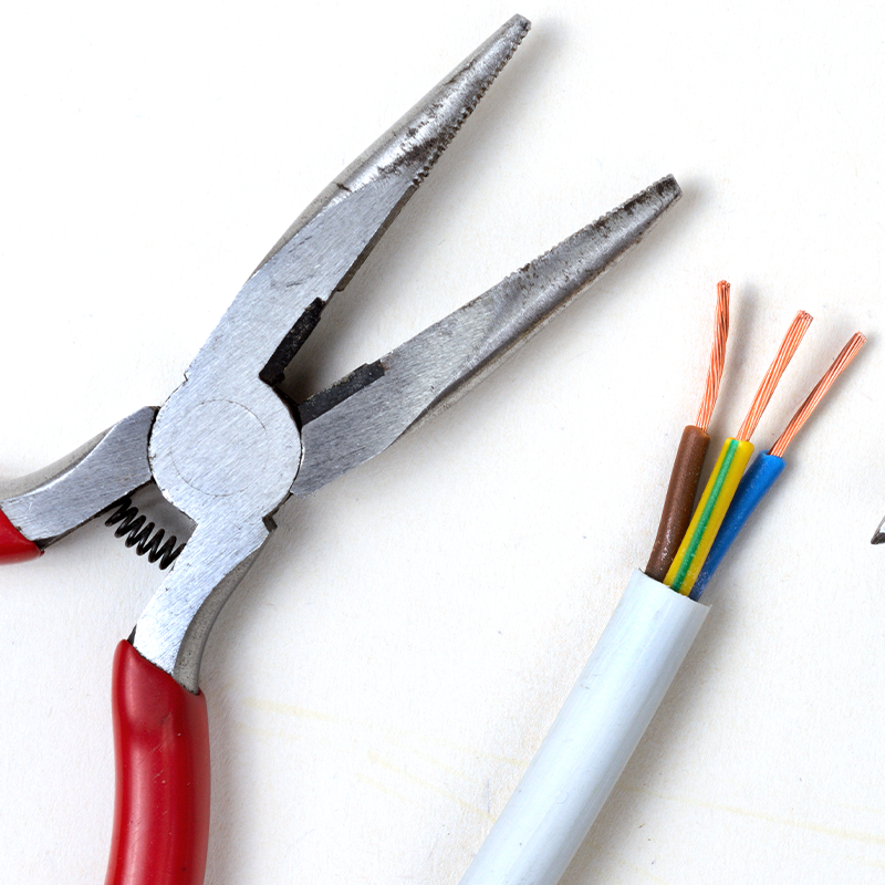 Wire cutters A hand-held cutting tool with two sharp blades used for cutting wires and cables. Wire cutters come in different sizes and shapes, including diagonal cutters, end cutters, and long-nose pliers, and are commonly used in electrical work, construction, and metalworking.