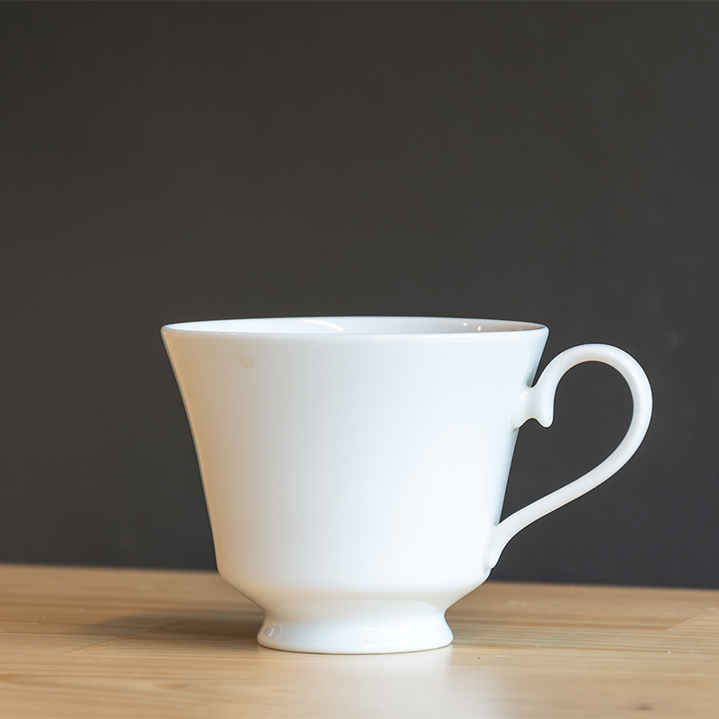 coffee-cup The coffee cup is typically made of ceramic, porcelain, or glass, and may feature a handle for easy holding.
