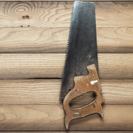 A hacksaw, a hand-held cutting tool with a C-shaped frame and a sharp blade used for cutting through metal, plastic, and other materials. The blade can be easily replaced and tightened with a wingnut, and hacksaws are commonly used in metalworking, plumbing, and other construction-related activities.