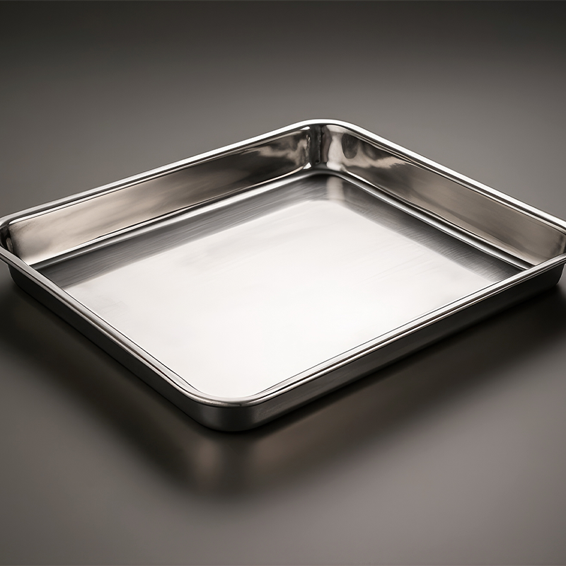 Baking tray A rectangular metal tray used for baking various types of foods, such as cookies, pastries, or sheet cakes.