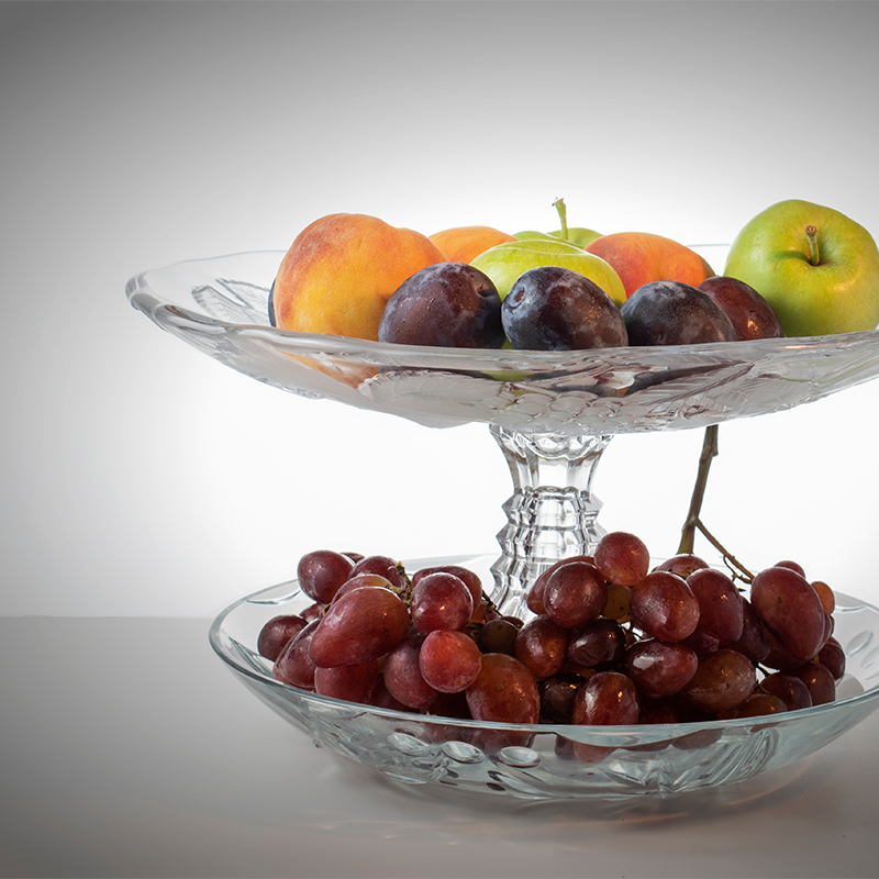Fruit tray The fruit tray is typically shallow and wide, allowing for easy arrangement and presentation of different fruits.