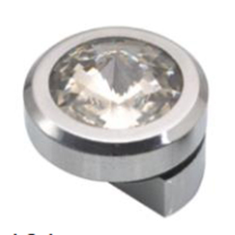 MIRROR BRACKET CRYSTAL A decorative bracket designed for supporting mirrors, featuring crystal accents and an elegant design.