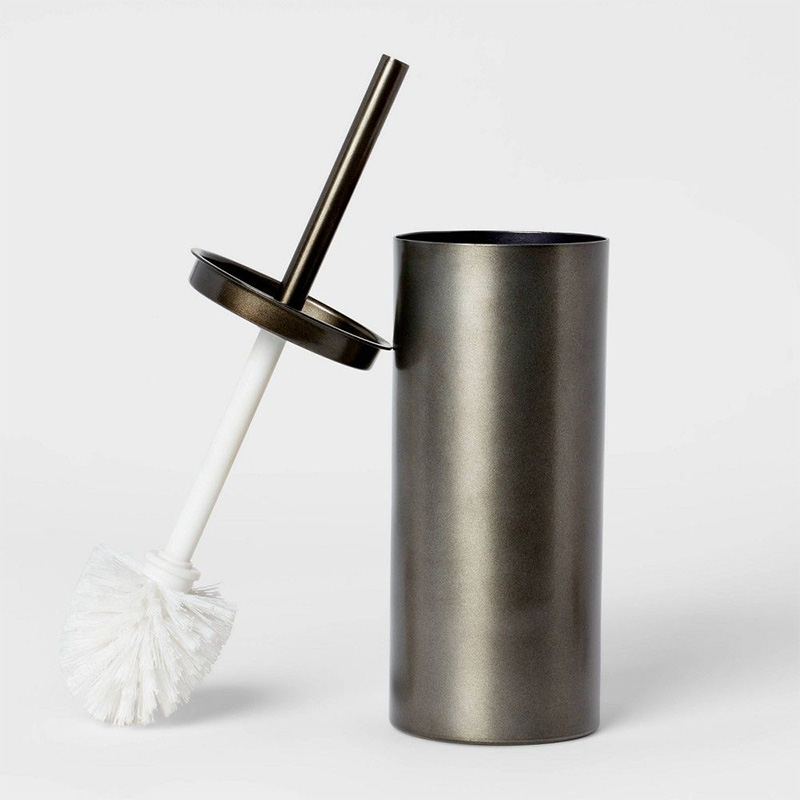 Toilet brush with holder A toilet brush with a matching holder for storage and cleanliness. The toilet brush typically consists of a long handle with bristles on one end, designed for cleaning the inside of a toilet bowl.
